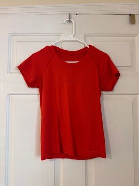 Womens race length red swiftly tech